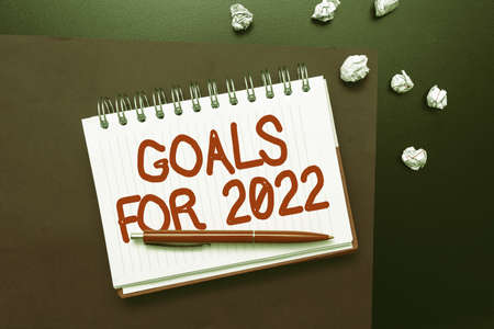 Text sign showing Goals For 2022. Word Written on object of persons ambition or effort aim or...