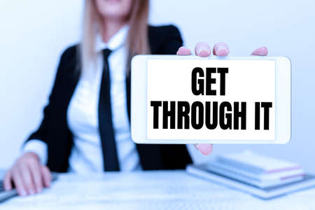 Text showing inspiration Get Through It. Word Written on enourage someone to succeed in passing or surviving Instructor Teaching Different Skills, Teacher Explaining New Methodsの写真素材