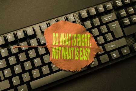 Conceptual caption Do What Is Right Not What Is Easy. Business concept willing to stand up for what...