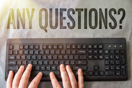 Sign displaying Any Questions Question. Business concept you say write order to ask person about something Hands Pointing Pressing Computer Keyboard Enter Keys Typewriting New Ideas.の写真素材