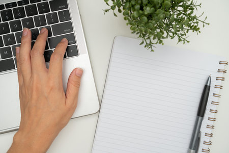 Office Supplies Over Desk With Keyboard And Glasses And Coffee Cup For Working Remotely, Assorted School Utilities For Studying With Hot Drink And Eyeglasses.の写真素材