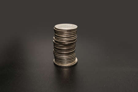 Coins Pile Over The Table Presenting Financial Plans. Mortgage Plans For Home And Office Using Money.の写真素材