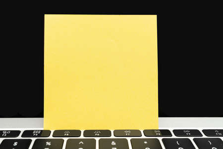 Office Supplies Over Desk With Keyboard And Glasses And Coffee Cup For Working Remotely, Assorted School Utilities For Studying With Hot Drink And Eyeglasses.の写真素材