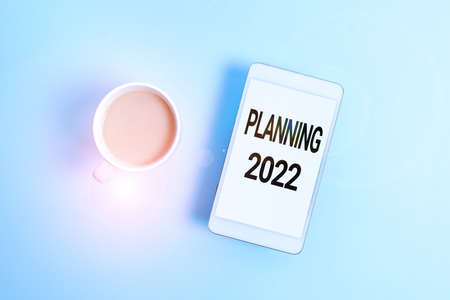 Text caption presenting Planning 2022. Internet Concept process of making plans for something next...