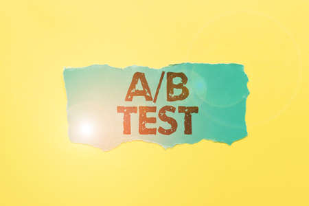 Hand writing sign A Or B Test. Business approach test to determine consumers prefer ability among products Critical Thinking Finding Clues Answering Questions Collecting Dataの写真素材