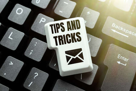 Conceptual display Tips And Tricks. Word Written on means piece advice maybe suggestion how improve Typing And Publishing Descriptions Online, Writing Informative Dataの写真素材