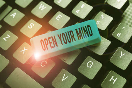 Sign displaying Open Your Mind. Concept meaning to be able to understand different ideas or ways of thinking Abstract Typing New Business Slogan Message, Writing Market Strategiesの写真素材