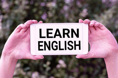 Inspiration showing sign Learn English. Word Written on gain acquire knowledge in new language by study Voice And Video Calling Capabilities Connecting People Togetherの写真素材