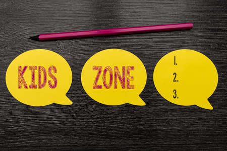 Sign displaying Kids Zone. Business approach An area or a region designed to enable children to play and enjoy New Idea Fresh Concept Creative Communication Productive Mindset Pencilの写真素材