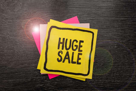Text showing inspiration Huge Sale. Business idea putting products on high discount Great price Black Friday New Ideas Fresh Concept Creative Communications Sticky Noteの写真素材