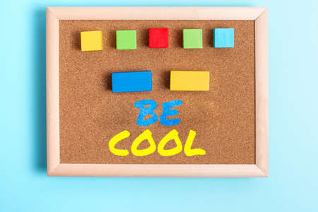 Text showing inspiration Be Cool. Concept meaning Have a good attitude be relaxed positive smile cheer you up Stack of Sample Cube Rectangular Boxes On Surface Polished With Multi-Colourの写真素材