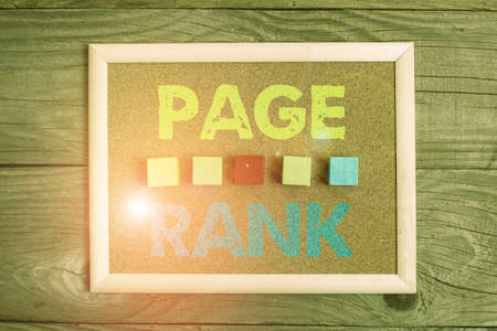 Conceptual caption Page Rank. Business idea a value assigned to a web page as a measure of its popularity Stack of Sample Cube Rectangular Boxes On Surface Polished With Multi-Colourの写真素材