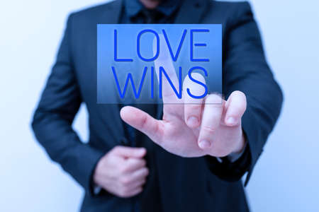 Sign displaying Love Wins. Business concept used to celebrate or commemorate the victory of marriage equality Presenting New Plans And Ideas Demonstrating Planning Processの写真素材