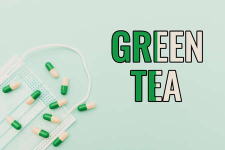 Hand writing sign Green Tea. Business concept type of tea that is made from Camellia sinensis leaves and buds Prescribed Medicine Vitamines And Minerals Pills And Medical Suppliesの写真素材