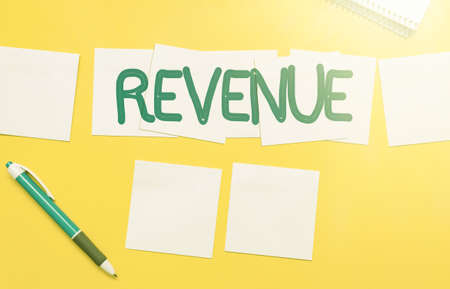 Writing displaying text Revenue. Business overview total amount of income generated by the sale of goods or services Critical Thinking Finding Clues Answering Questions Collecting Dataの写真素材