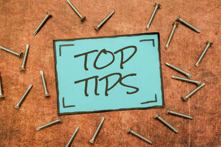 Text showing inspiration Top Tips. Word for a small but particularly useful piece of practical advice New Ideas Brainstoming For Maintenance Planning Creative Thinkingの写真素材