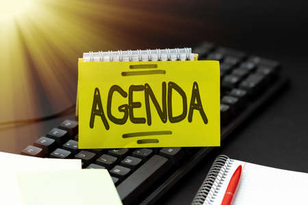 Hand writing sign Agenda. Word Written on list items that participants hope to accomplish at meetings Abstract Typing Lesson And Lecture Plans, Retyping Song Lyricsの写真素材