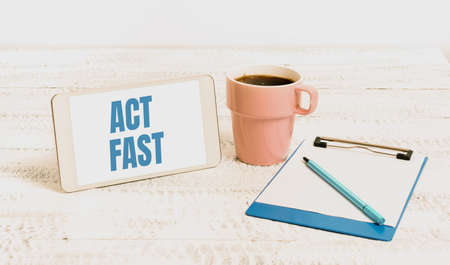 Text sign showing Act Fast. Business showcase Voluntarily move in the highest state of speed initiatively Wireless Communications Voice And Video Calls Writing Important Notesの写真素材
