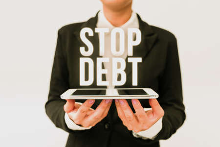 Inspiration showing sign Stop Debt. Business overview does not owning any money or things to any individual or companies Presenting New Technology Ideas Discussing Technological Improvementの写真素材