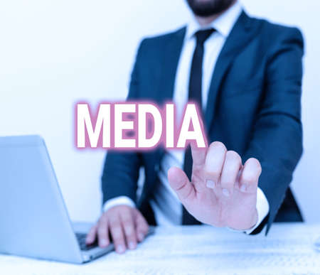 Text caption presenting Media. Conceptual photo the main means of mass communicationthat are regarded collectively Remote Office Work Online Presenting Communication Technologyの写真素材