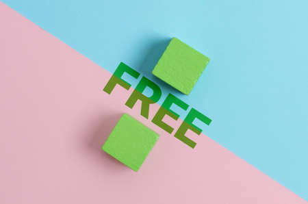 Conceptual caption Free. Business showcase Enjoying personal rights and liberty Not under any control and power Two Objects Arranged Facing Inward Outward On a Separated Coloured Backgroundの写真素材