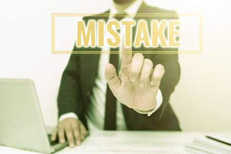 Text caption presenting Mistake. Word Written on Something not correct Lack of accuracy Wrong Incorrect Fail Remote Office Work Online Presenting Communication Technologyの写真素材
