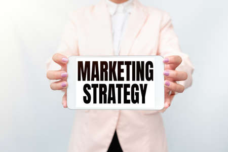Conceptual caption Marketing Strategy. Concept meaning Scheme on How to Lay out Products Services Business Presenting New Technology Ideas Discussing Technological Improvementの写真素材