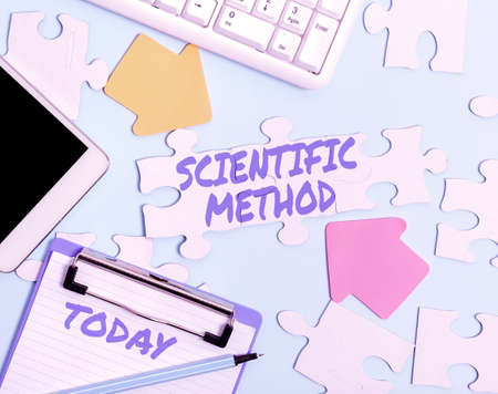 Text sign showing Scientific Method. Business approach Principles Procedures for the logical hunt of knowledge Building An Unfinished White Jigsaw Pattern Puzzle With Missing Last Pieceの写真素材