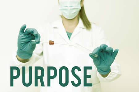 Text caption presenting Purpose. Word for The reason for which something is done or created and exists Presenting And Analyzing Medical Specimen Displaying Test Samplesの写真素材