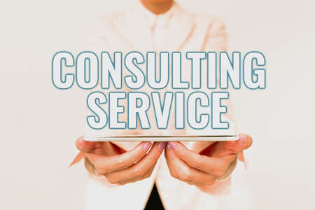 Writing displaying text Consulting Service. Business idea Experts that offers knowledge to a third...