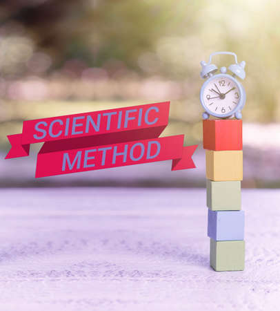 Text sign showing Scientific Method. Concept meaning Principles Procedures for the logical hunt of knowledge Working Activities Outside, Presenting Time Management Skillsの写真素材