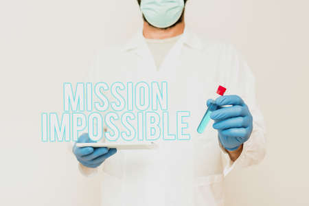 Text caption presenting Mission Impossible. Conceptual photo Difficult Dangerous Assignment Isolated Unimaginable Task Researcher Displaying Liquid Sample, Chemist Presenting Cleaning Agentの写真素材