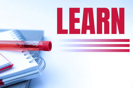 Hand writing sign Learn. Conceptual photo acquire knowledge of or skill in something by study or experience Writing Important Medical Notes Laboratory Testing Of New Virus Medicineの写真素材