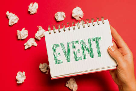 Sign displaying Event. Conceptual photo Function to generate money for non profit a Crowded Occassion Drawing Creative Designs Taking Important Notes Planning New Ideasの写真素材