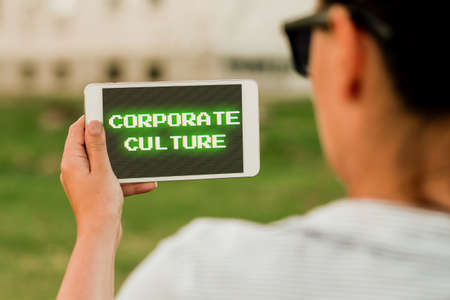 Text sign showing Corporate Culture. Business approach Beliefs and ideas that a company has Shared values Voice And Video Calling Capabilities Connecting People Togetherの写真素材