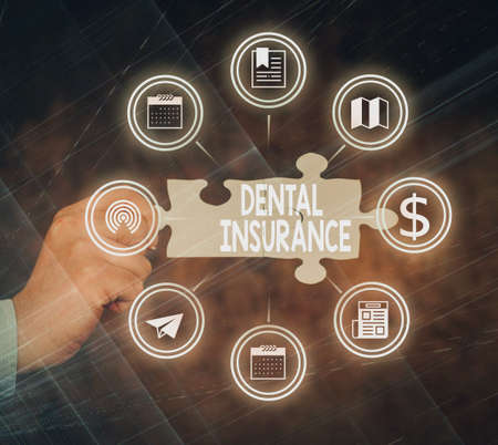 Sign displaying Dental Insurance. Business concept form of health designed to pay portion or full of costs Hand Holding Jigsaw Puzzle Piece Unlocking New Futuristic Technologies.の写真素材