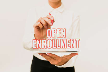 Text sign showing Open Enrollment. Business overview The yearly period when showing can enroll an insurance Presenting New Technology Ideas Discussing Technological Improvementの写真素材