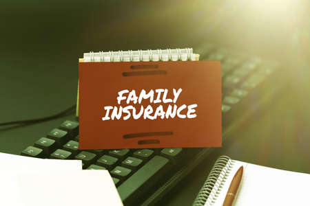 Sign displaying Family Insurance. Business showcase paying a partial or full health care for relatives Inputting Important Informations Online, Typing Funny Internet Blogの写真素材