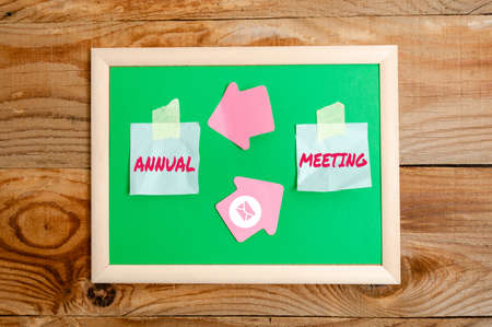 Inspiration showing sign Annual Meeting. Business idea Yearly gathering of an organization interested shareholders Display of Different Color Sticker Notes Arranged On flatlay Lay Backgroundの写真素材