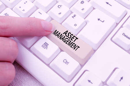 Hand writing sign Asset Management. Word Written on systematic process of operating and disposing of assets Editing Internet Files, Filtering Online Forums, Web Research Ideasの写真素材