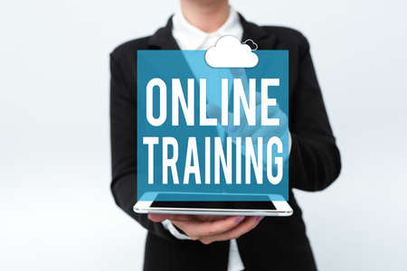 Text caption presenting Online Training. Concept meaning Take the education program from the electronic means Presenting New Technology Ideas Discussing Technological Improvementの写真素材