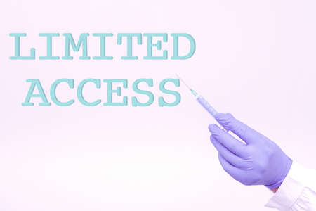 Writing displaying text Limited Access. Internet Concept Having access restricted to a quite small...