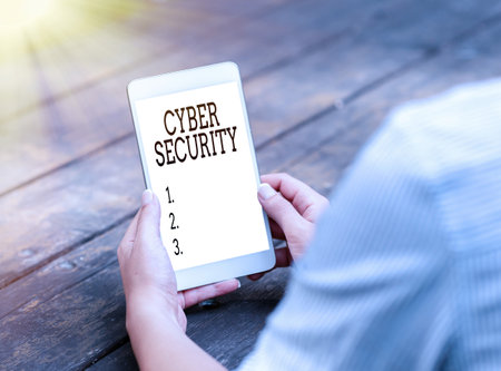 Hand writing sign Cyber Security. Concept meaning Protect a computer system against unauthorized...
