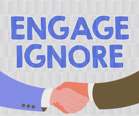 Text showing inspiration Engage Ignore. Word for Silent Treatment Manipulative Punishment Sulking Shunning Two Men Drawing With Paper Background Shake Hands Presenting Agreementの写真素材