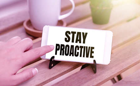 Hand writing sign Stay Proactive. Word Written on Taking own decision to go ahead of anticipated events Voice And Video Calling Capabilities Connecting People Togetherの写真素材