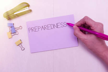 Hand writing sign Preparedness. Word Written on quality or state of being prepared in case of...