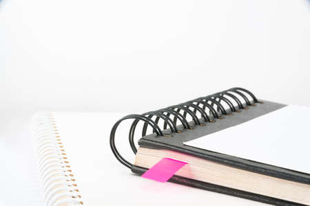 Blank Opened Spiral Notebook Placed On A Table. Empty Open Notepad On Top Of A Desk