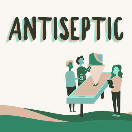 Conceptual caption Antiseptic. Business showcase antimicrobial agents that delays or completely eliminate the microorganism Colleagues Drawing Standing Beside Table Projection Graph Chart.の写真素材