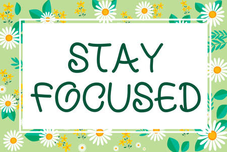 Conceptual display Stay Focused. Word Written on Be attentive Concentrate Prioritize the task Avoid distractions Blank Frame Decorated With Abstract Modernized Forms Flowers And Foliage.の写真素材