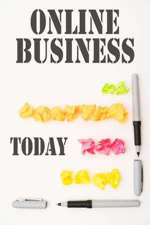 Conceptual display Online Business. Business overview Commercial transaction sharing information in the internet Multiple Assorted Collection Office Stationery Photo Placed Over Tableの写真素材